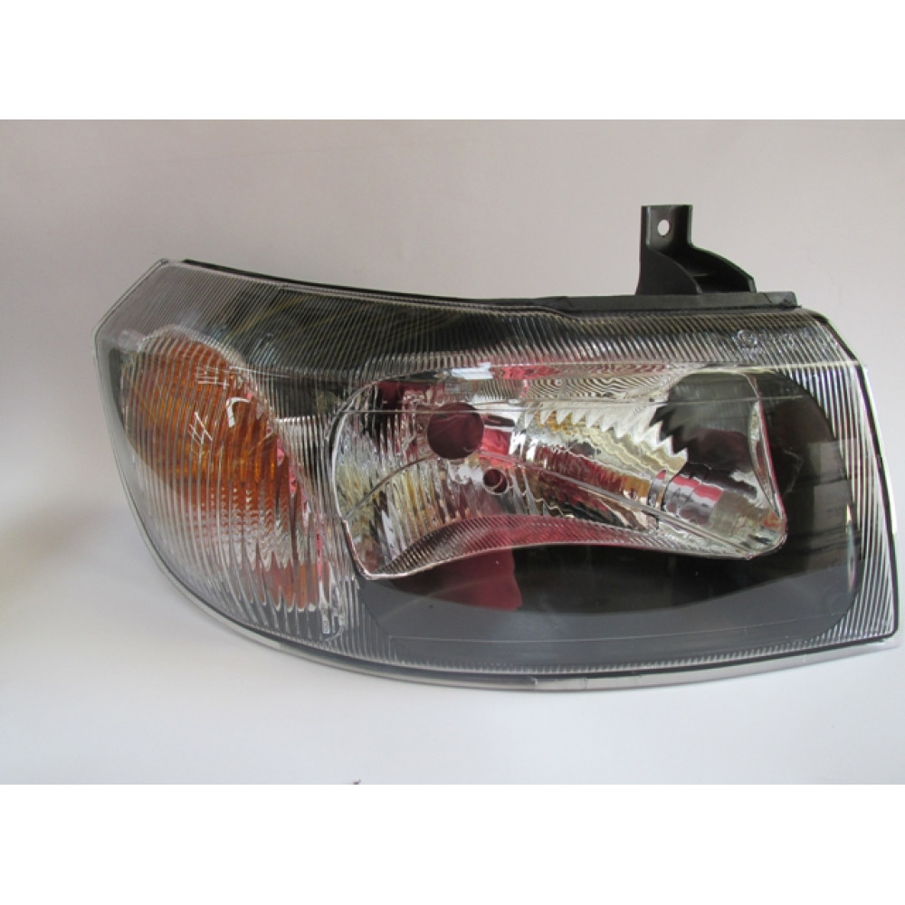FORD TRANSIT- V184- 02/06; FAR LAMBASI SAĞ ELEKTRİKLİ/MANUEL SİYAH 4 FİŞLİ (H4)(AYFAR) (E MARKLI) 866-1003